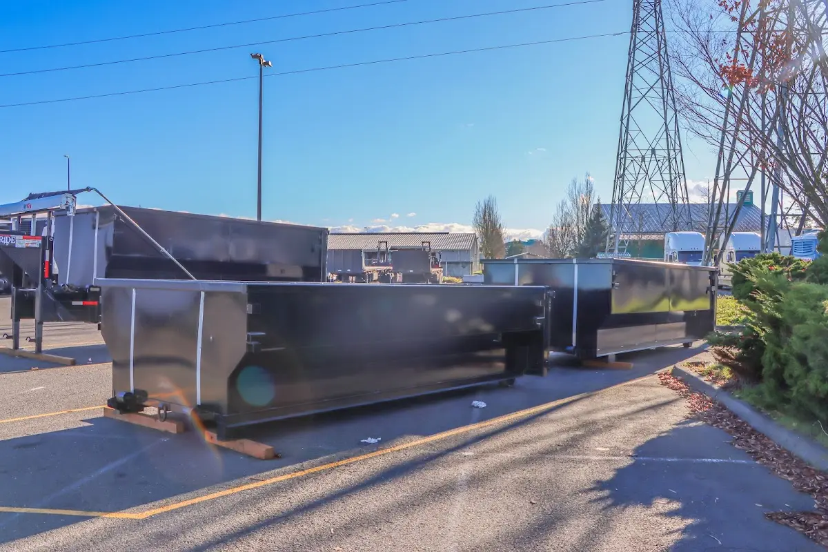 Roll-off dumpster ready for waste disposal at job site for Demolition Dumpster Rental in Clemmons